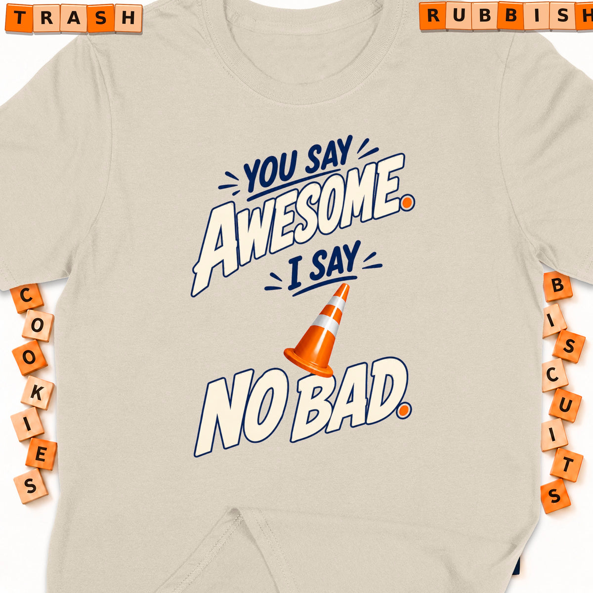 Cream t-shirt with "You say awesome, I say no bad" graphic and orange traffic cone.