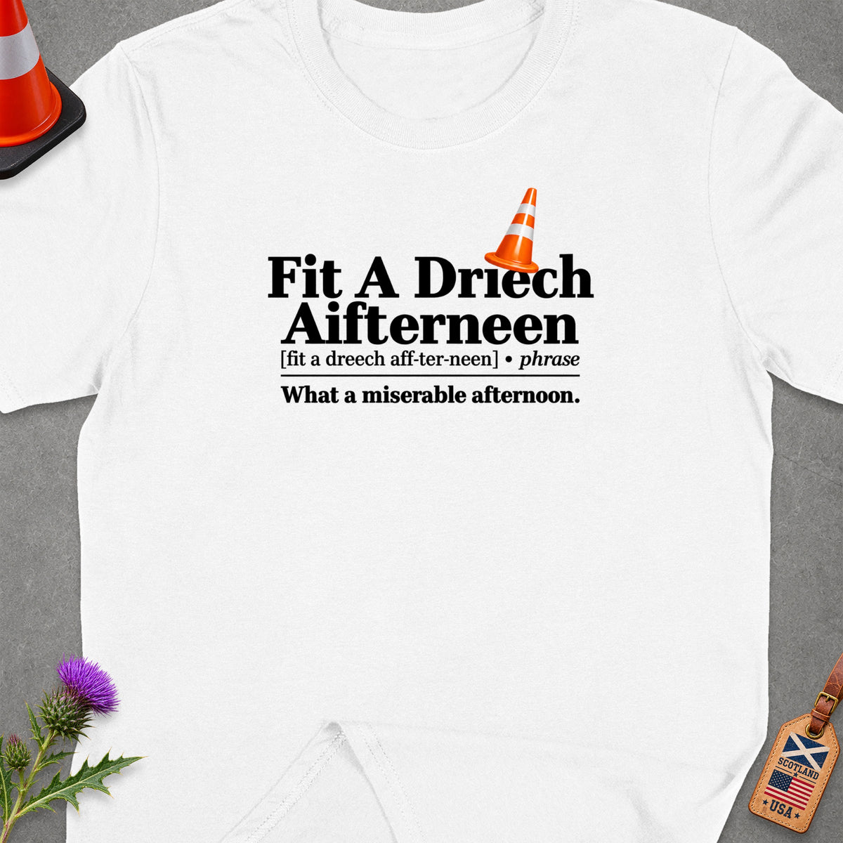 White t-shirt with "Fit A Driech Aifterneen" text and definition.