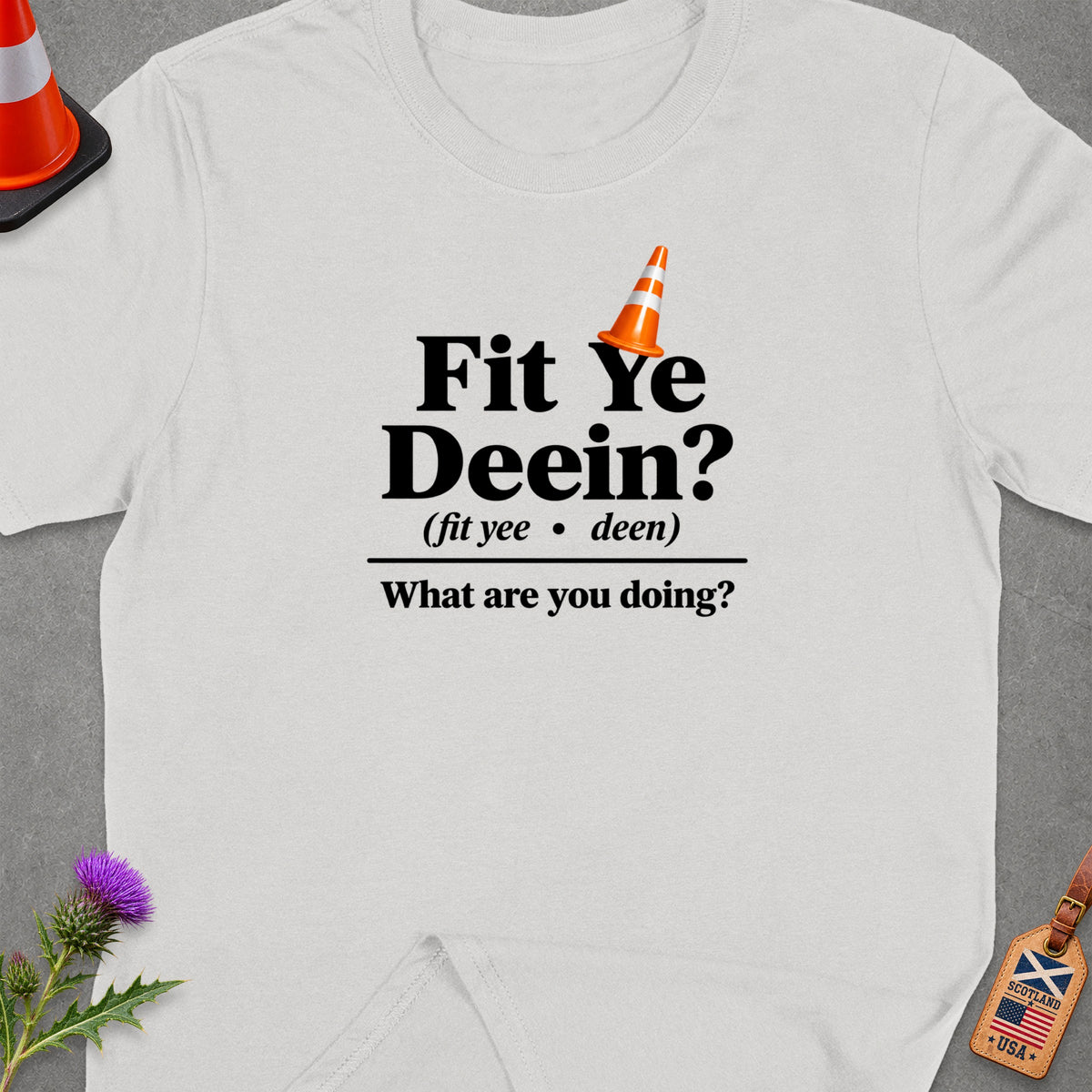 White t-shirt with "Fit Ye Deein? (fit yee • deen) What are you doing?" text.