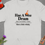 White t-shirt with "Hae A Wee Dram" and "Have a little whisky." text.