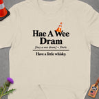 Cream t-shirt with "Hae A Wee Dram" and "Have a little whisky" text.