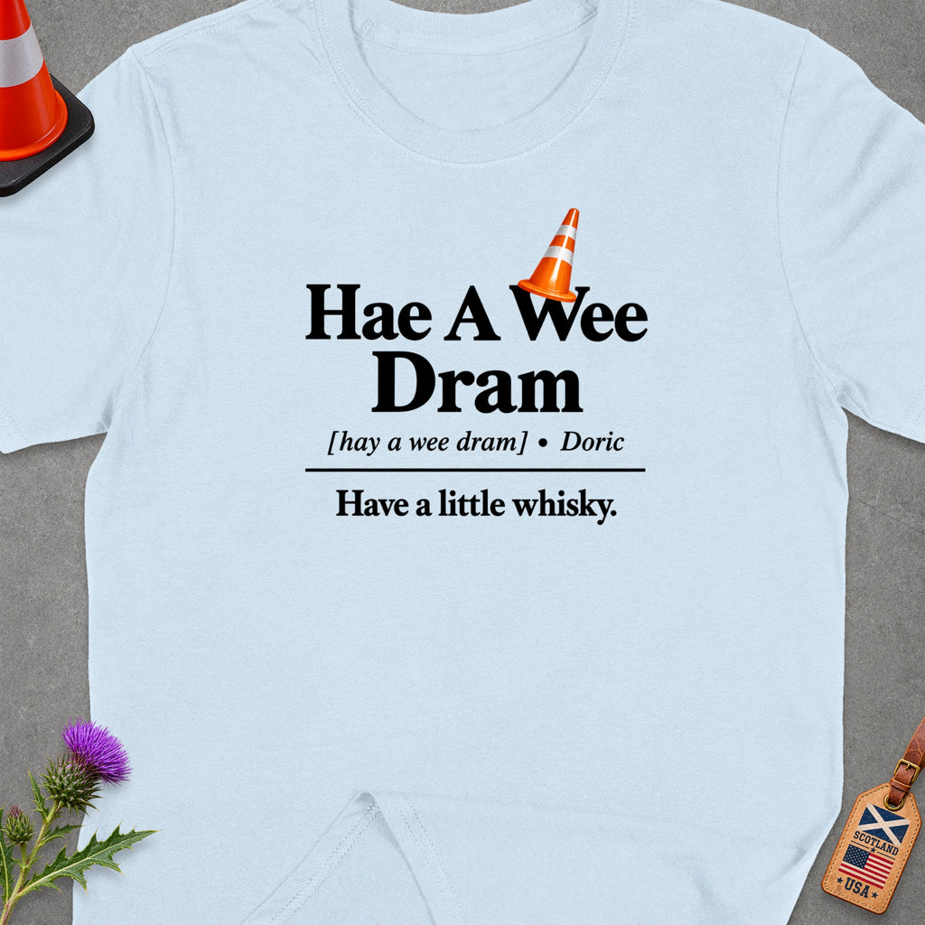 Light blue t-shirt with "Hae A Wee Dram" and "Have a little whisky." text.
