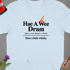 Light blue t-shirt with "Hae A Wee Dram" and "Have a little whisky." text.