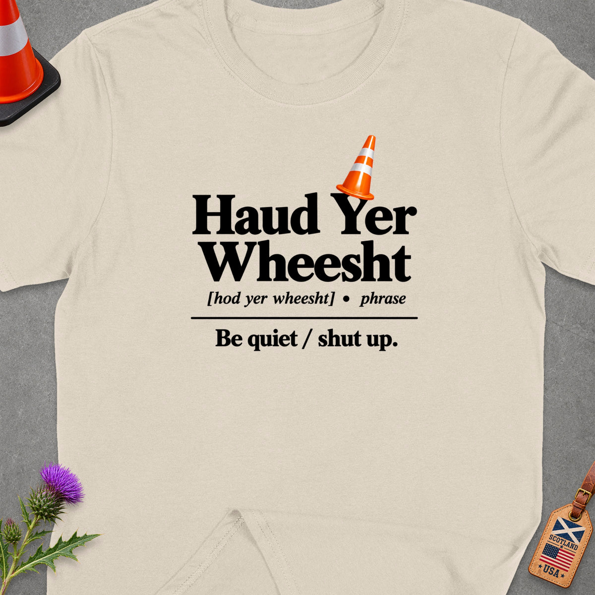 Cream t-shirt with "Haud Yer Wheesht" phrase and definition.
