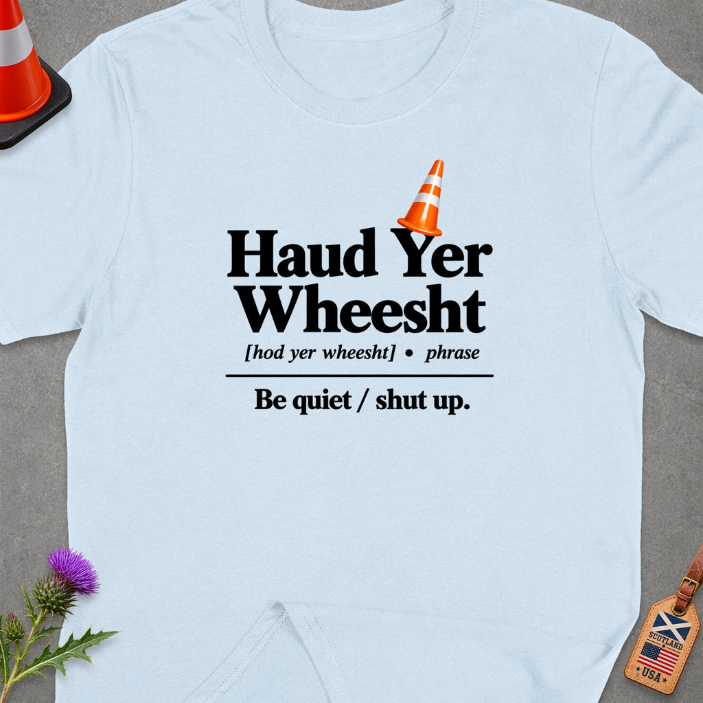 Light blue t-shirt with "Haud Yer Wheesht" and "Be quiet / shut up." text.