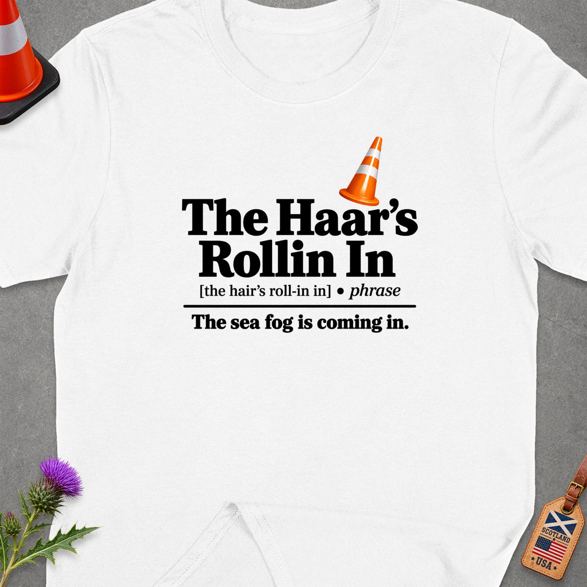 White t-shirt with "The Haar's Rollin In" and "The sea fog is coming in" text.