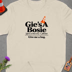 Cream t-shirt with "Gie's A Bosie" and "Give me a hug" text.