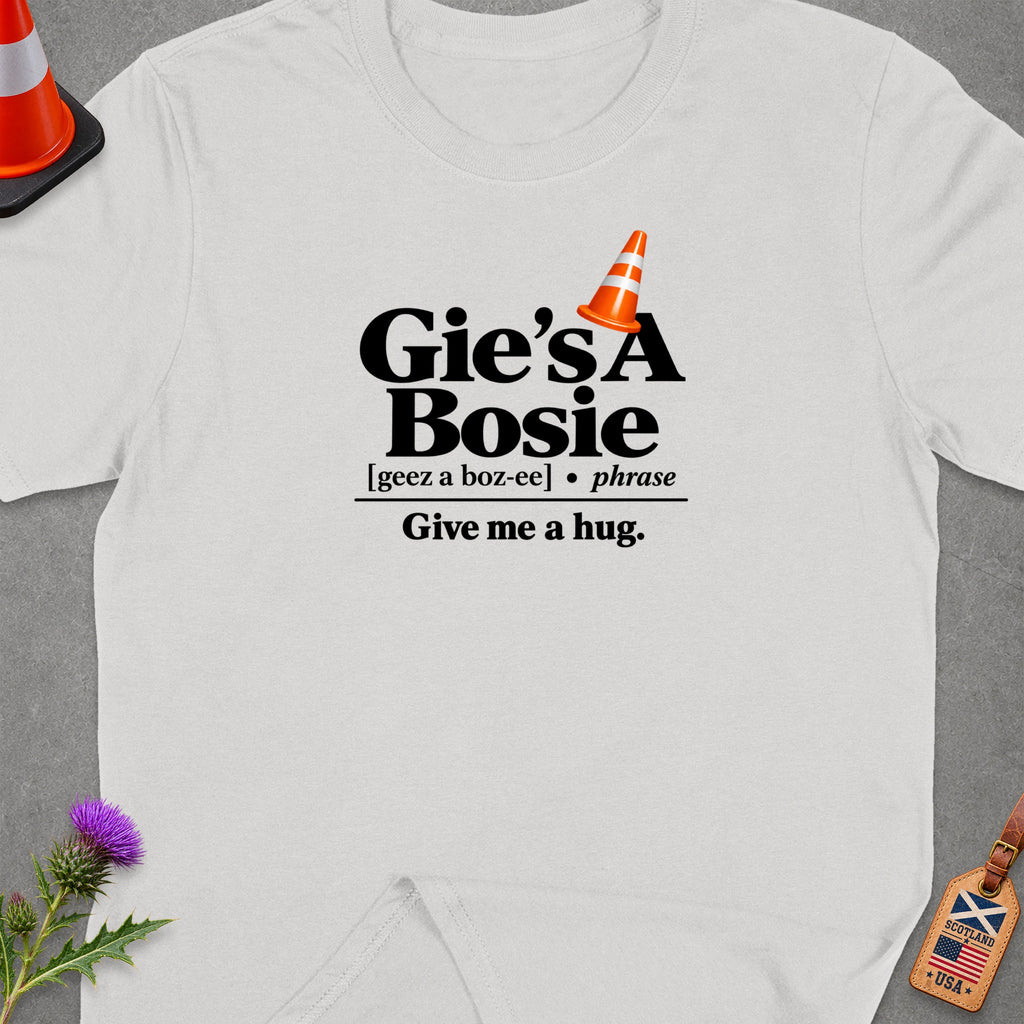 White t-shirt with "Gie's A Bosie Give me a hug" text and an orange traffic cone.