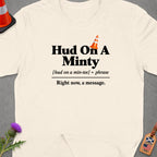 Cream t-shirt with "Hud On A Minty" text and traffic cone graphic.