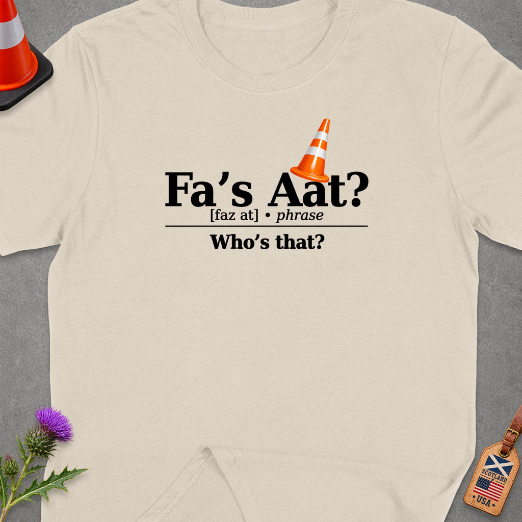 T-shirt with "Fa's Aat? Who's that?" text, a traffic cone, and a Scottish-American tag.