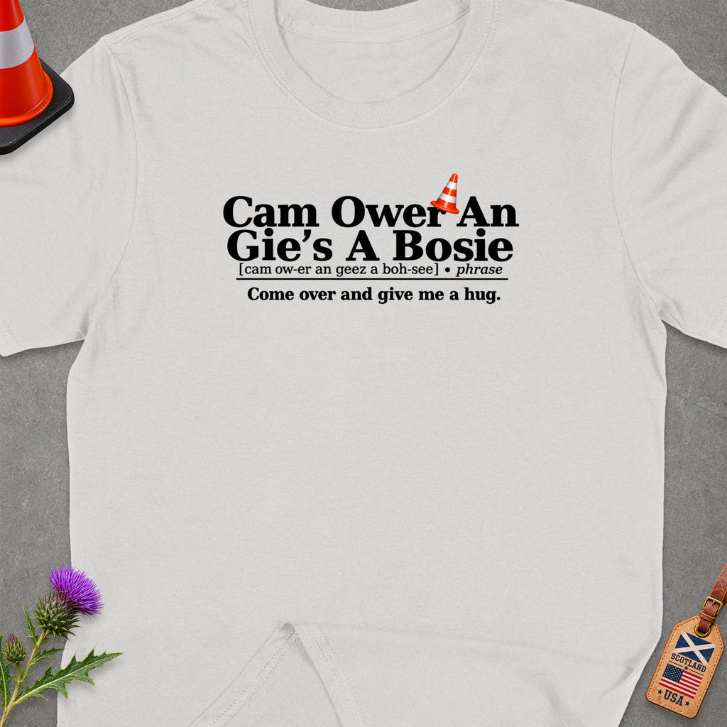 White t-shirt with Scottish phrase "Cam Ower An Gie's A Bosie" meaning "Come over and give me a hug."