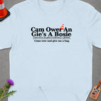 Light blue t-shirt with text defining "Cam Ower An Gie's A Bosie" as "Come over and give me a hug."