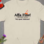 Cream t-shirt with text "Affa Fine! Very good / delicious!".