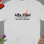 White t-shirt with "Affa Fine! Very good / delicious!" text and traffic cone graphic.