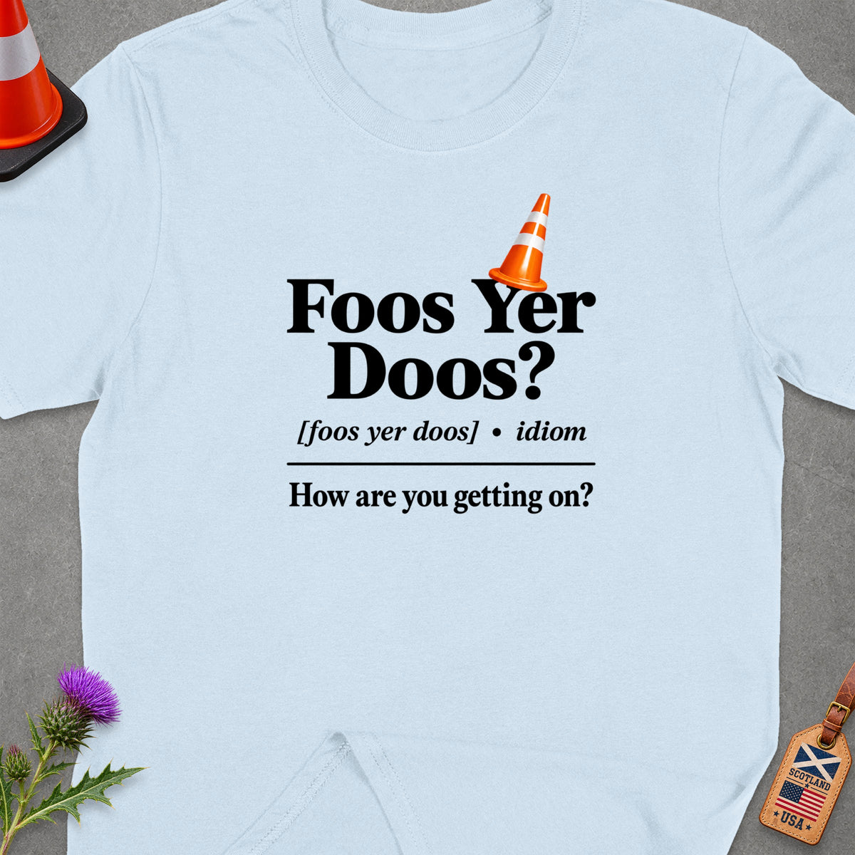 Light blue t-shirt with "Foos Yer Doos?" text and a traffic cone graphic.