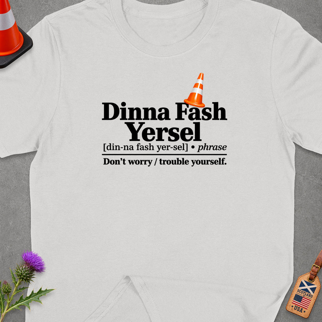 White t-shirt with "Dinna Fash Yersel" phrase definition and Scotland USA tag.