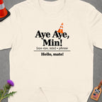 Cream t-shirt with text "Aye Aye, Min!" and "Hello, mate!".