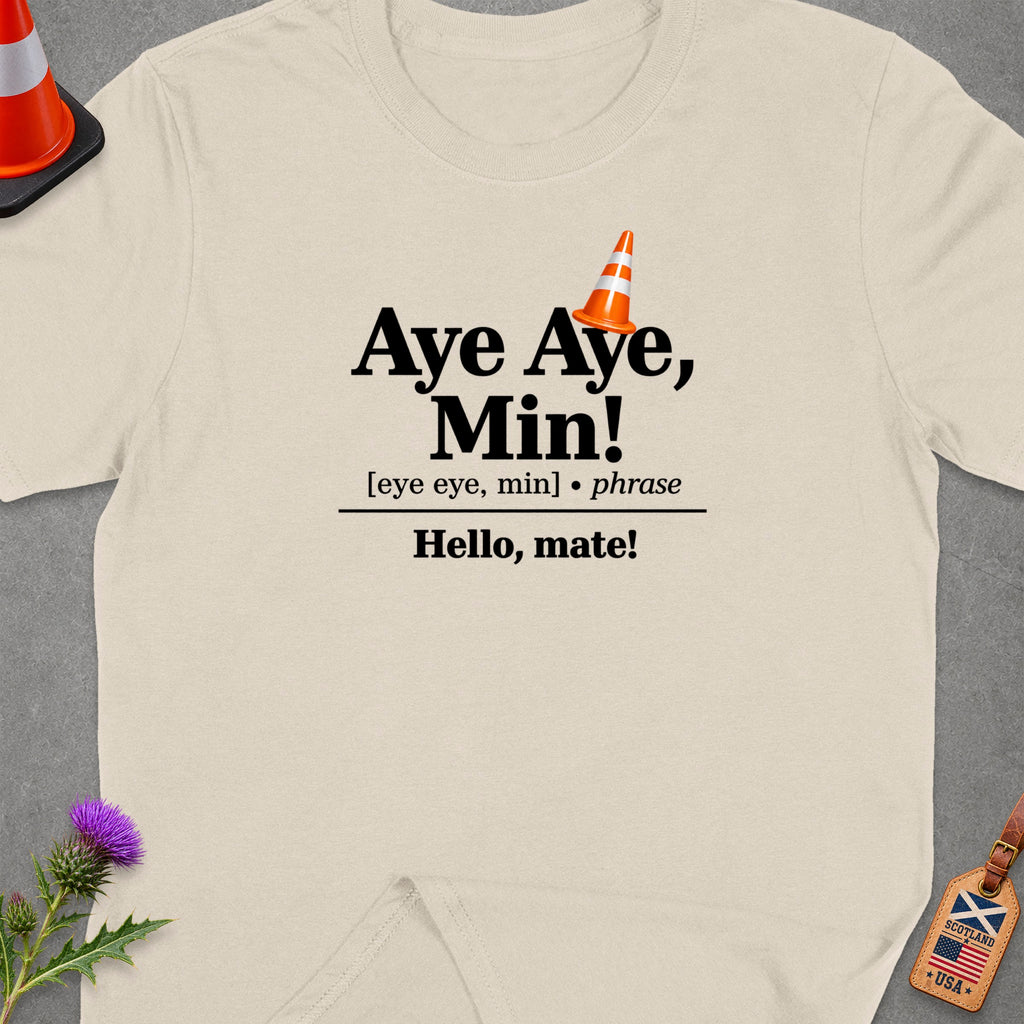 Light beige t-shirt with "Aye Aye, Min!" and "Hello, mate!" text.