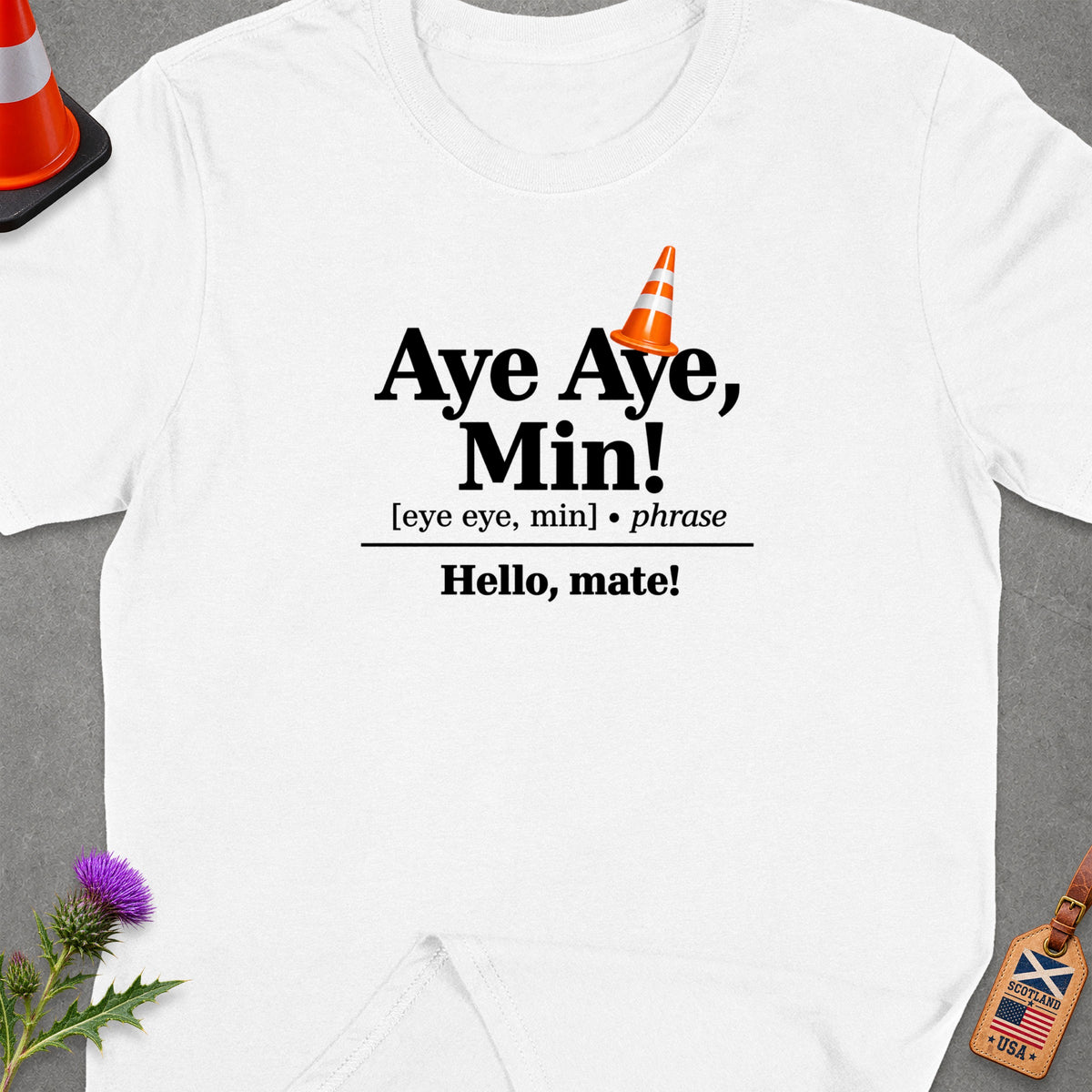 White t-shirt with "Aye Aye, Min!" and "Hello, mate!" text.