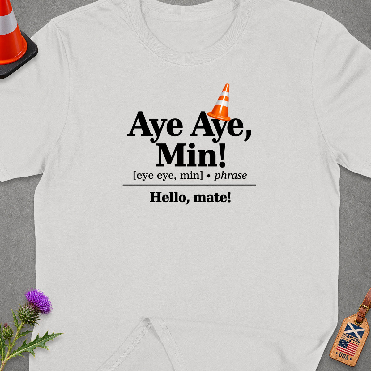 White t-shirt with "Aye Aye, Min!" and "Hello, mate!" text.