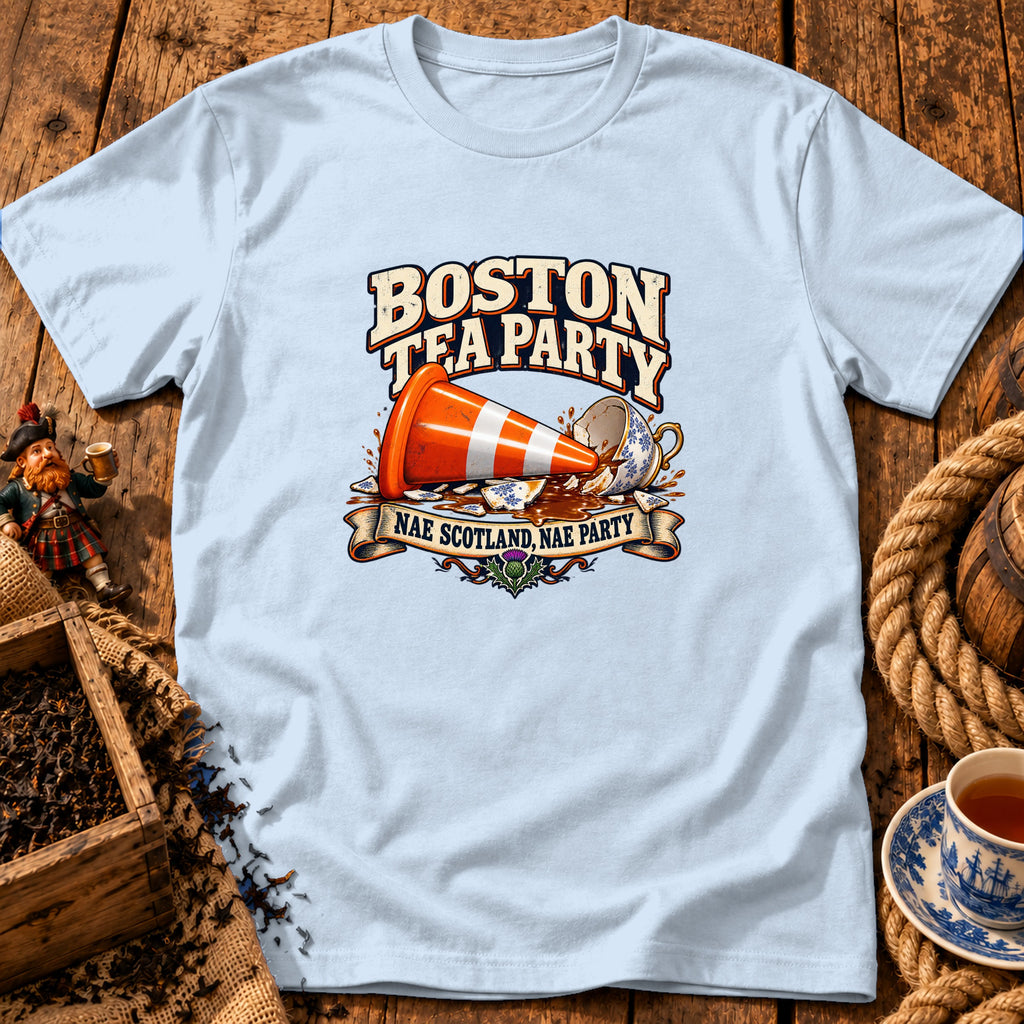 Light blue t-shirt displaying a graphic of a traffic cone inside a broken teacup with Boston Tea Party text.