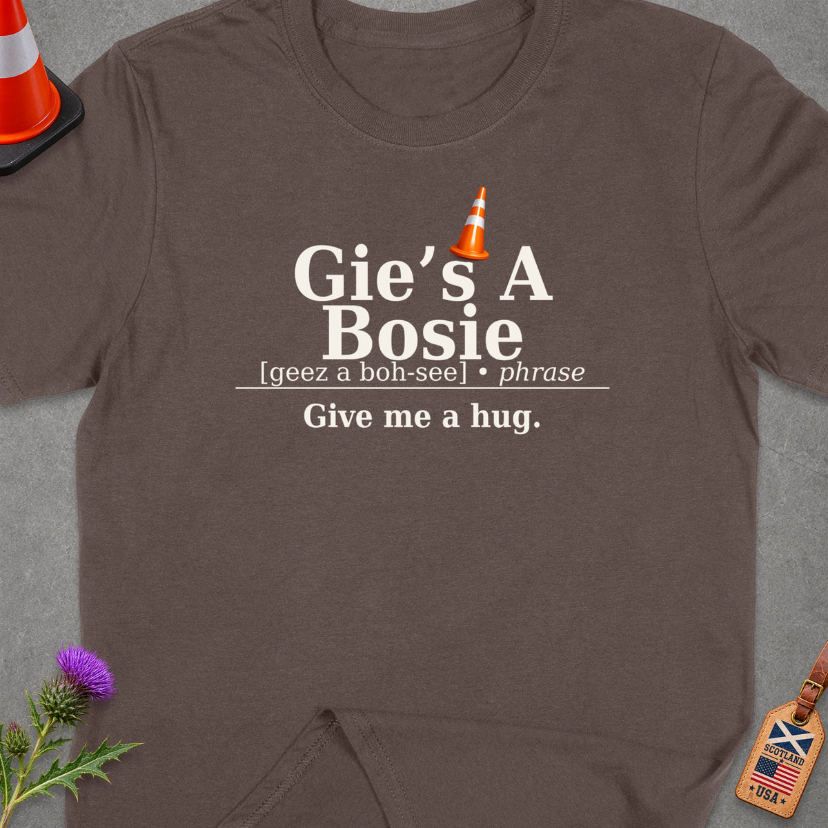 Brown t-shirt with text "Gie's A Bosie Give me a hug."