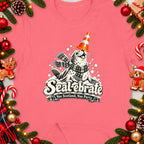 Seal wearing a scarf and party hat, text "Sealebrate Nae Scotland, Nae Party."