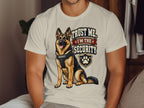 German Shepherd wearing security vest with text "Trust Me, I'm The Security".
