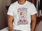 White t-shirt with illustration of poodle and text "Fluff with Benefits".