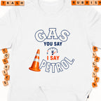 White t-shirt with "GAS YOU SAY I SAY PETROL" text, traffic cone, and fuel gauge.