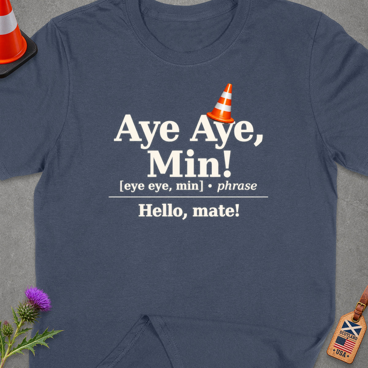 T-shirt with "Aye Aye, Min! Hello, mate!" text and traffic cone graphic.