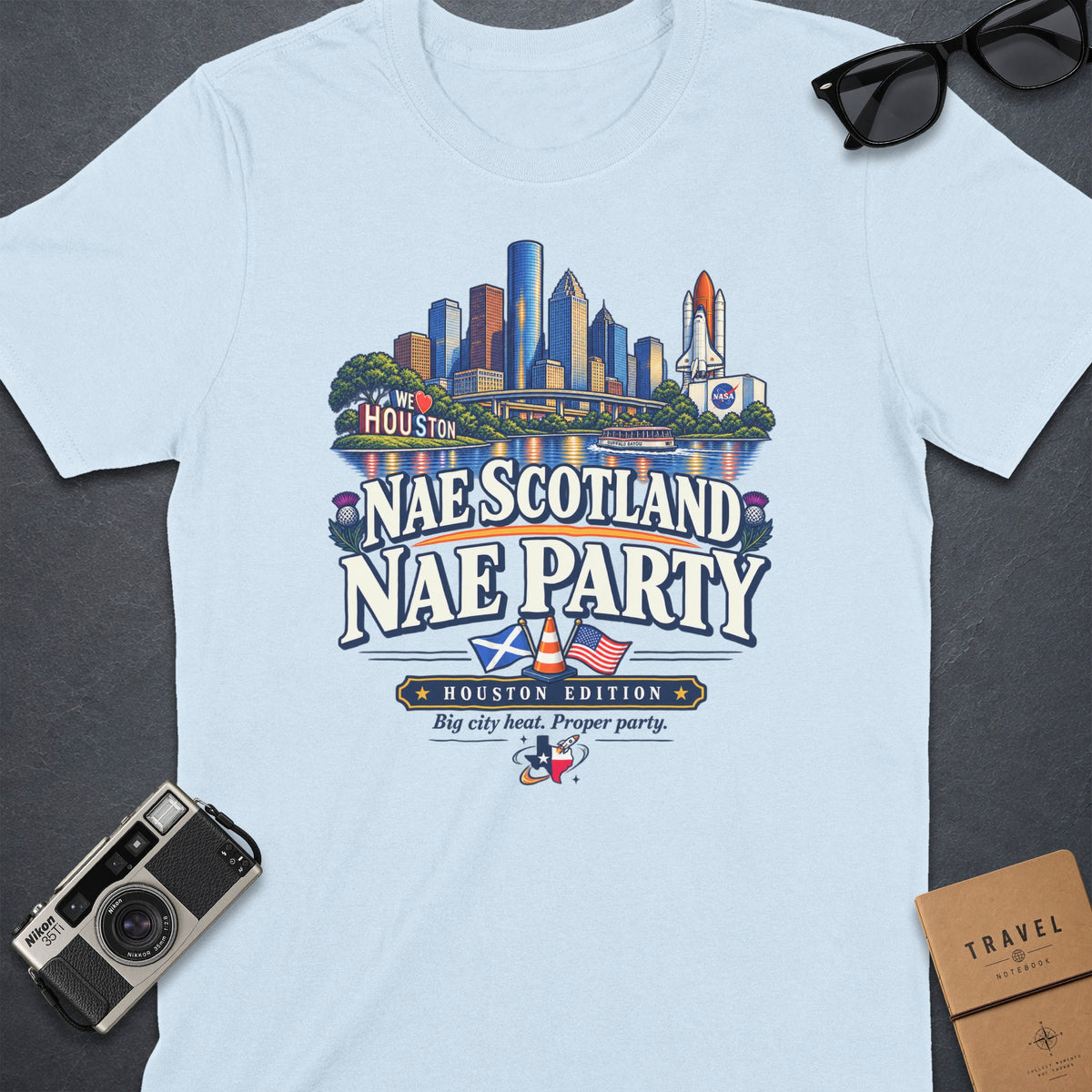 Light blue t-shirt with Houston skyline, NASA, and "Nae Scotland Nae Party" text.