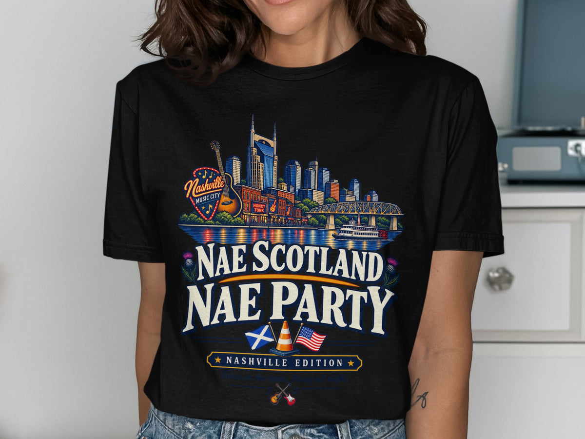 Black t-shirt with Nashville skyline, Scottish and US flags, and "Nae Scotland Nae Party" text.