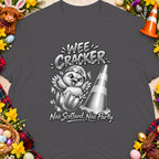 "Wee Cracker" text with a chick hatching from an egg and a traffic cone.