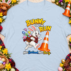 Cartoon bunny with Easter eggs and a traffic cone, text "Bunny on the Run".