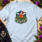 Light blue t-shirt featuring a crest with a thistle wearing a traffic cone and text reading NAE SCOTLAND NAE PARTY.