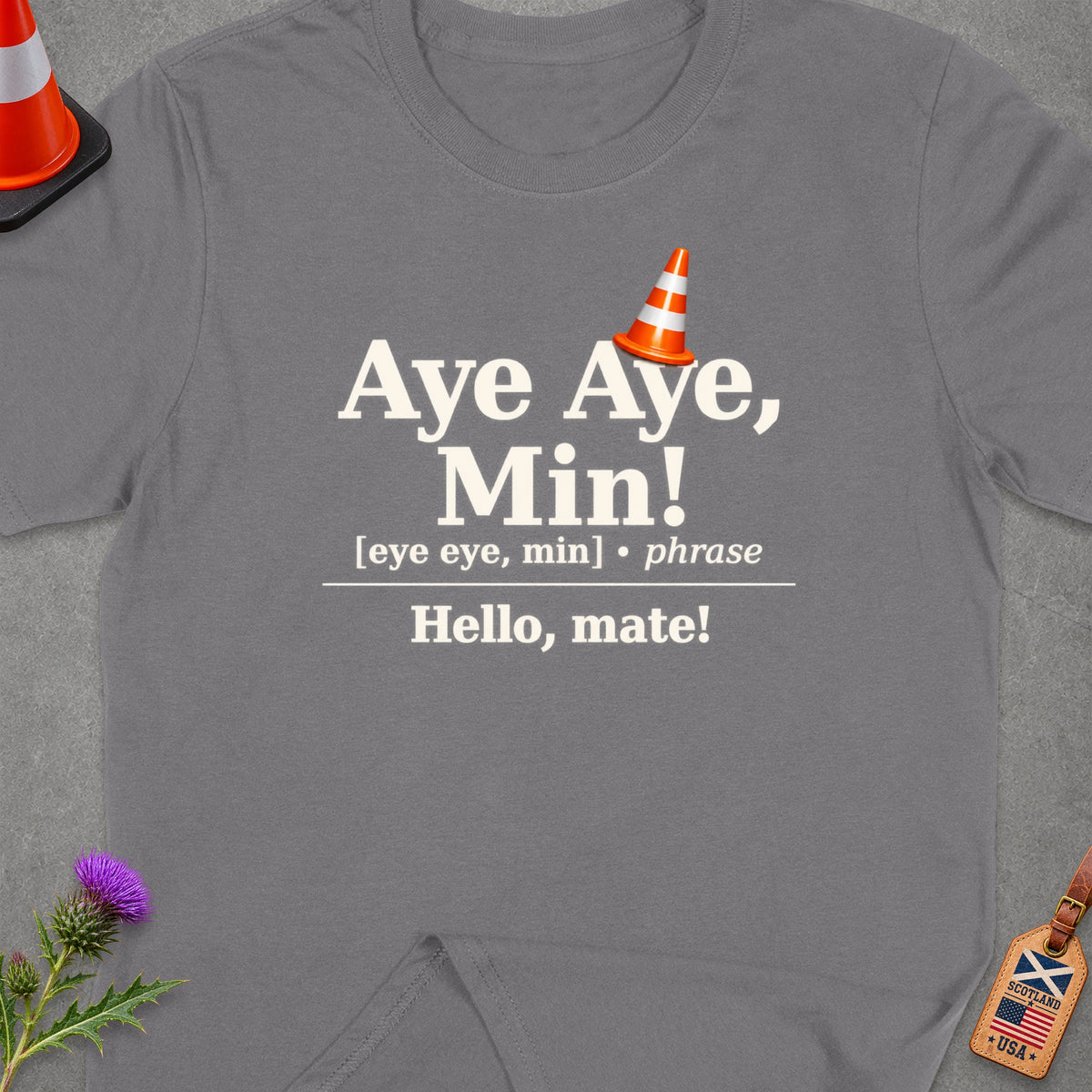 Gray t-shirt with "Aye Aye, Min! Hello, mate!" text.