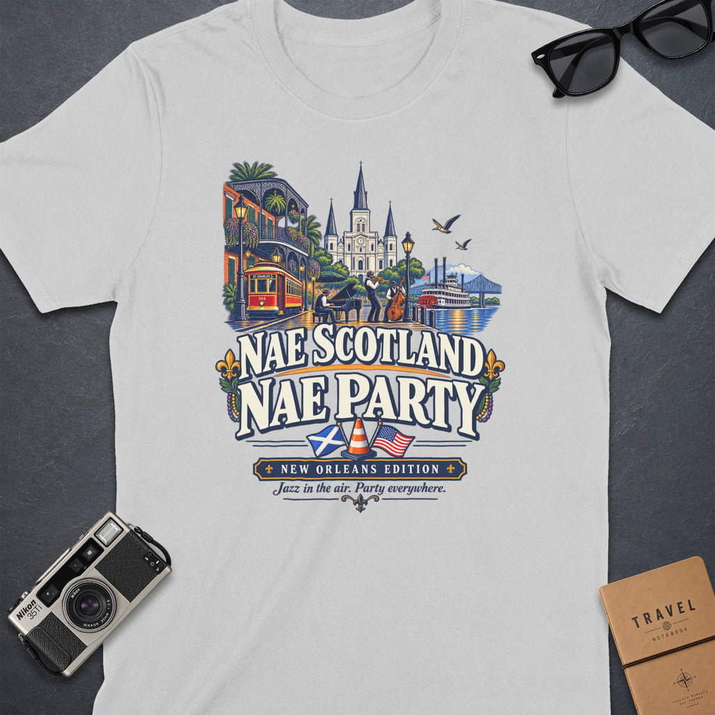 White t-shirt with "Nae Scotland Nae Party New Orleans Edition" graphic.