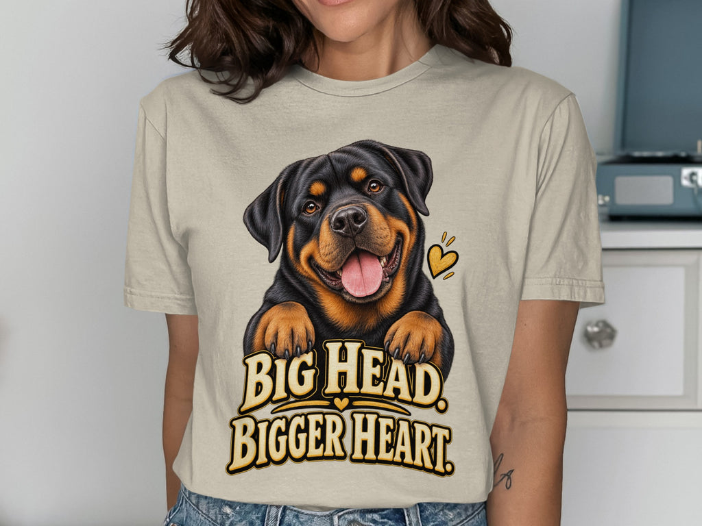 T-shirt with a smiling Rottweiler graphic and text "BIG HEAD BIGGER HEART".