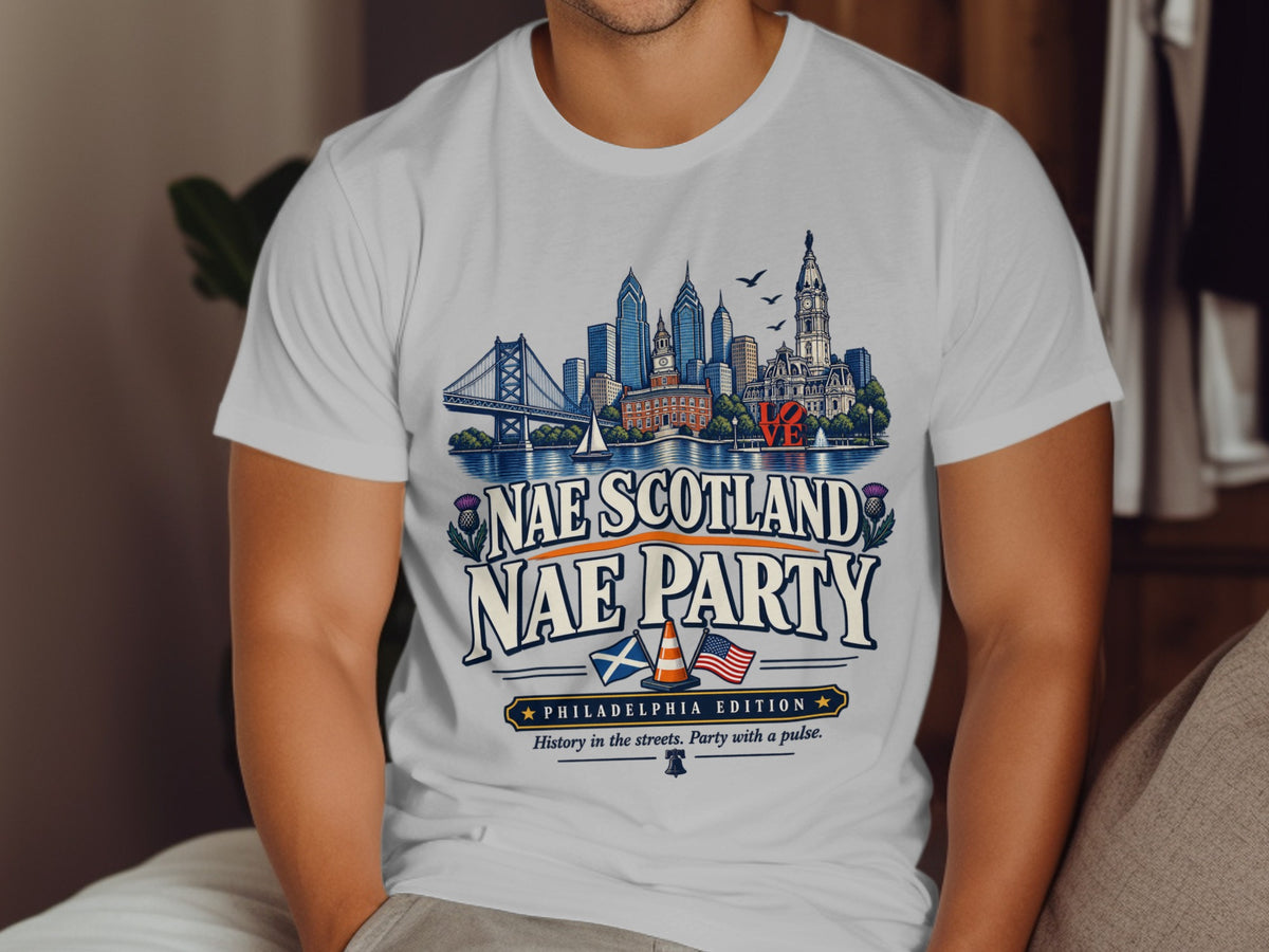 White t-shirt with Philadelphia skyline graphic and "Nae Scotland Nae Party" text.