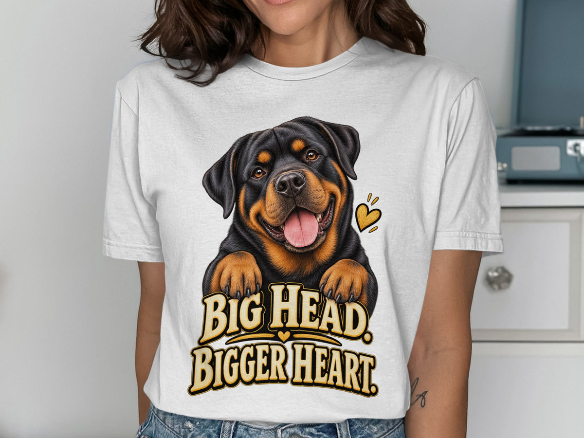 White t-shirt with Rottweiler illustration and text "Big Head Bigger Heart".