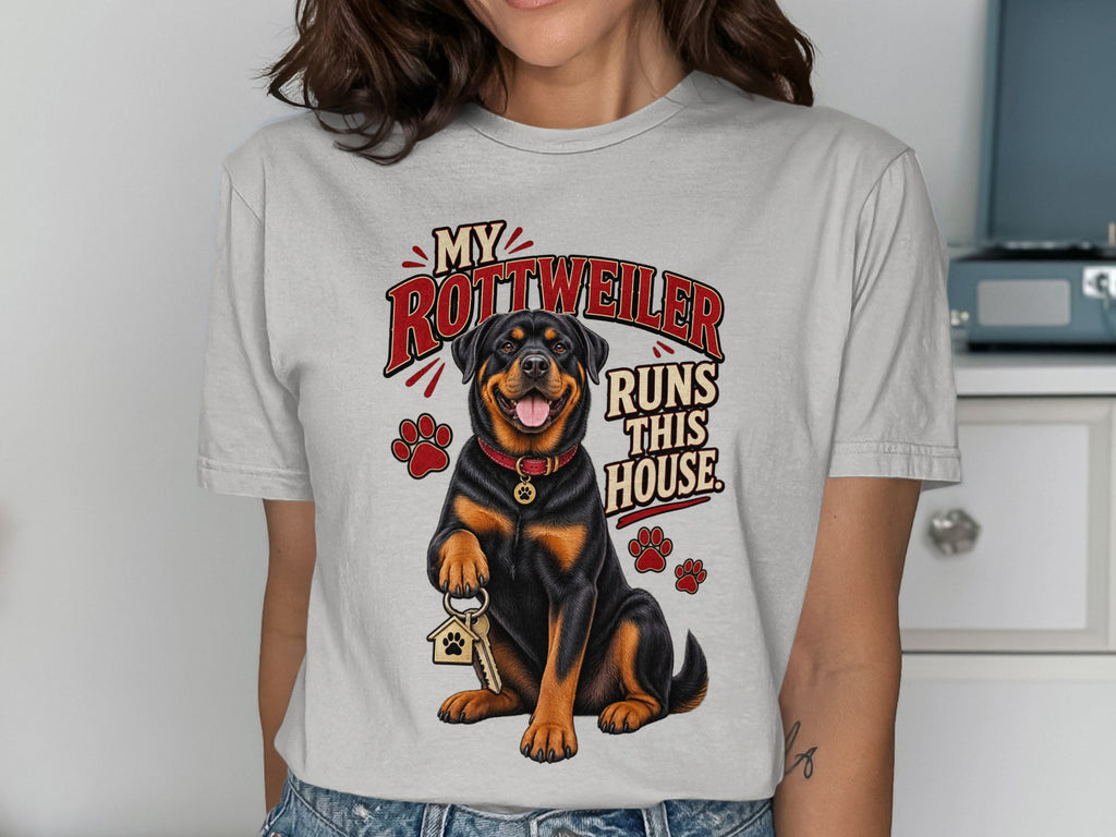 Rottweiler with keys and "My Rottweiler Runs This House" text on a light grey t-shirt.