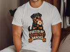 Rottweiler graphic on white t-shirt reads "Fueled by Loyalty & Snacks".