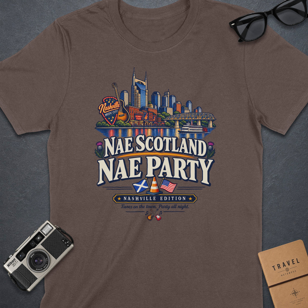 Brown t-shirt with Nashville skyline, "Nae Scotland Nae Party" text, and musical instruments.
