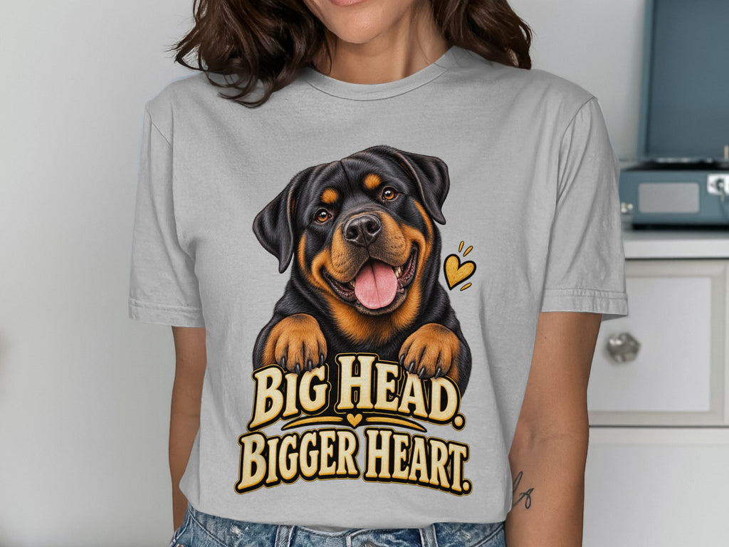 Rottweiler illustration on a grey t-shirt with text "BIG HEAD BIGGER HEART."