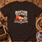 A dark brown t-shirt featuring a graphic with text that reads Boston Tea Party and Nae Scotland, Nae Party.