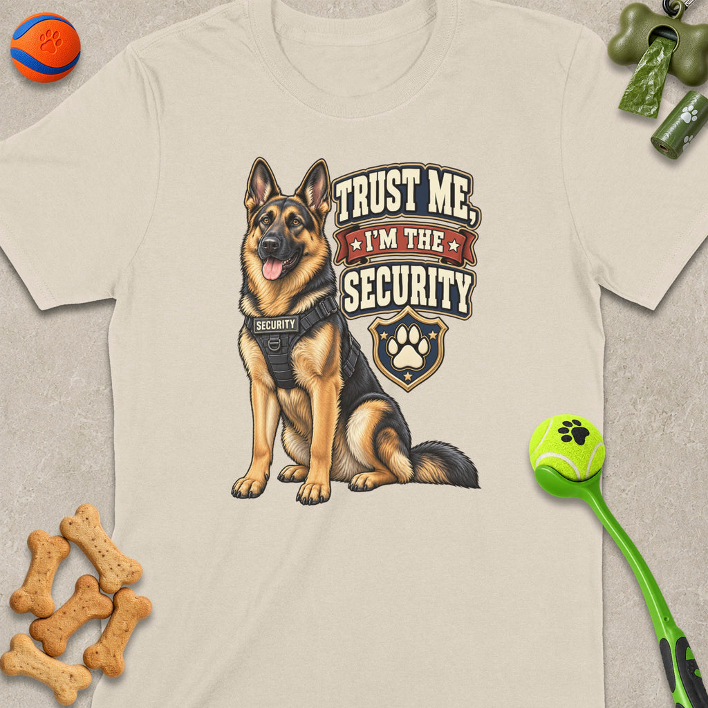 German Shepherd wearing a security vest with text "Trust Me, I'm The Security".