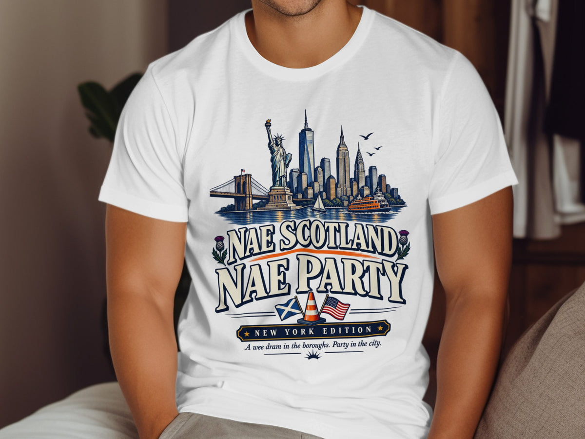 White t-shirt with New York skyline, "Nae Scotland Nae Party" text, and Scottish/American flags.