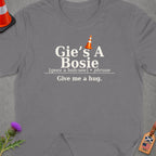 Grey t-shirt with "Gie's A Bosie Give me a hug" text.