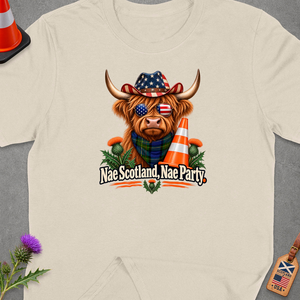 Highland cow wearing American flag hat and sunglasses, with text "Nae Scotland, Nae Party".
